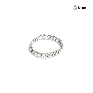Anillo entretejido
