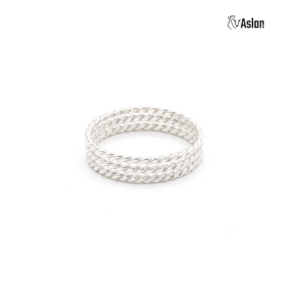 Anillo triple torcido