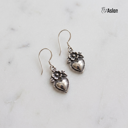 Arete corazón florido
