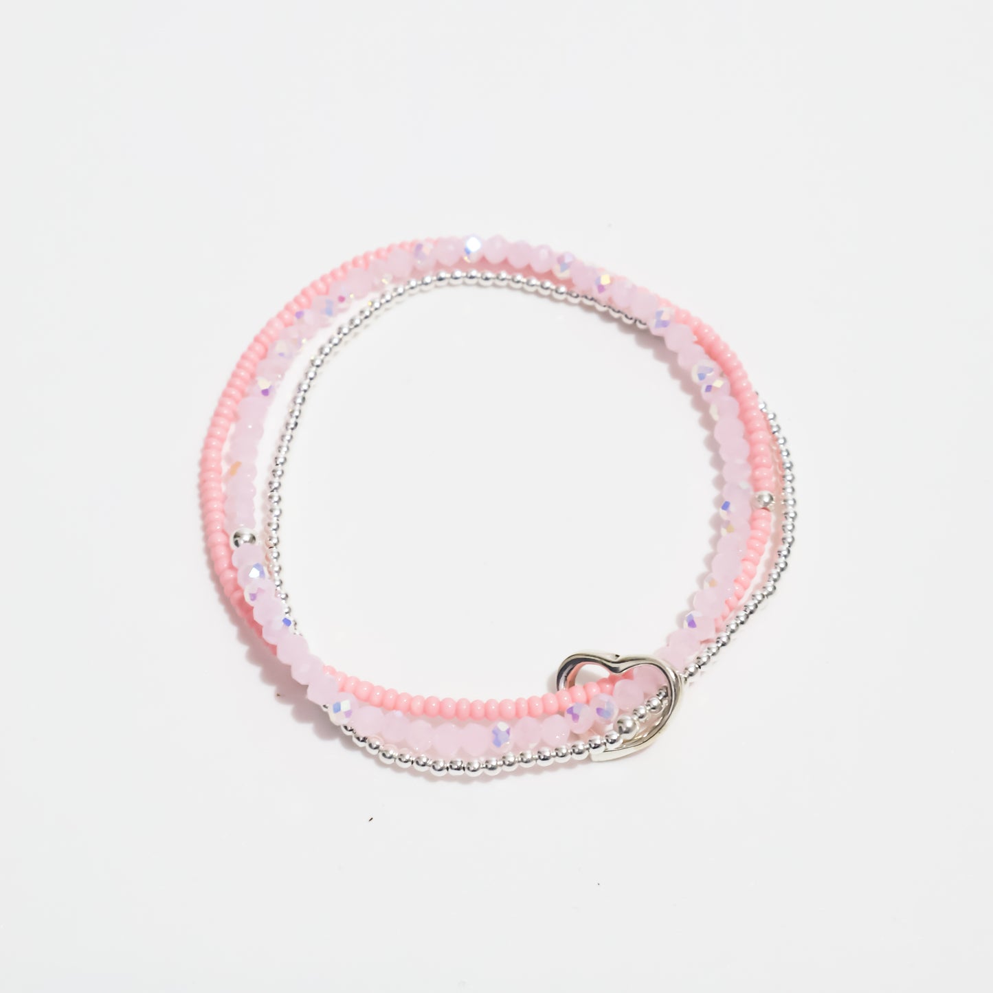 Pulsera triple de corazón pastel