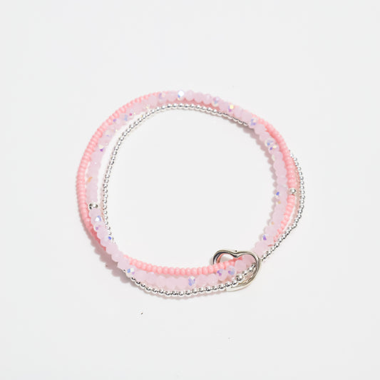 Pulsera triple de corazón pastel