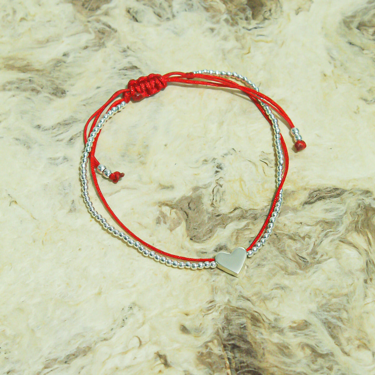 Pulsera de hilo y plata