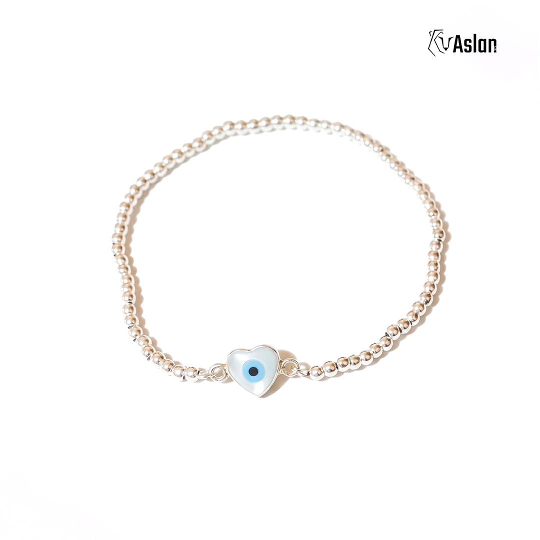 Pulsera de ojito montado