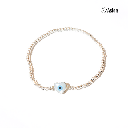 Pulsera de ojito montado