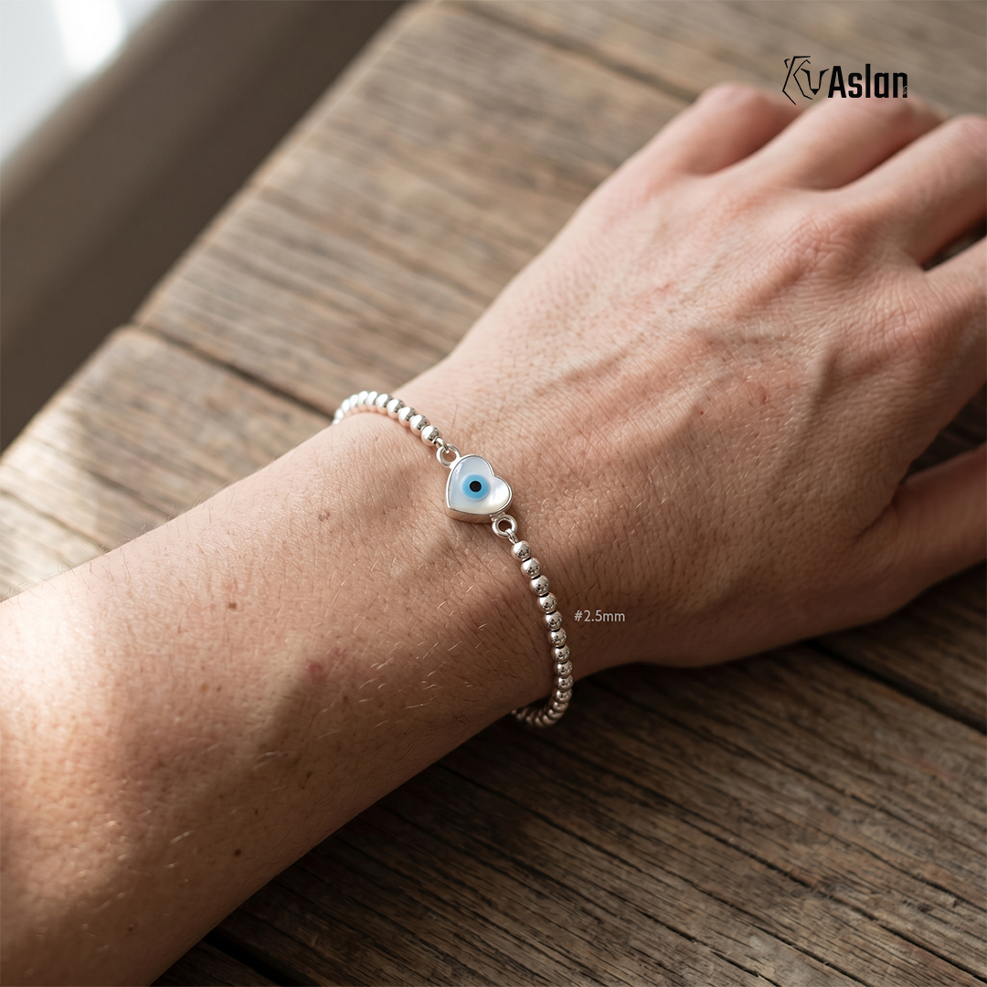 Pulsera de ojito montado