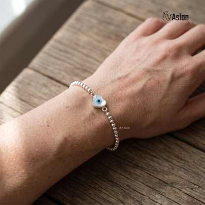 Pulsera de ojito montado