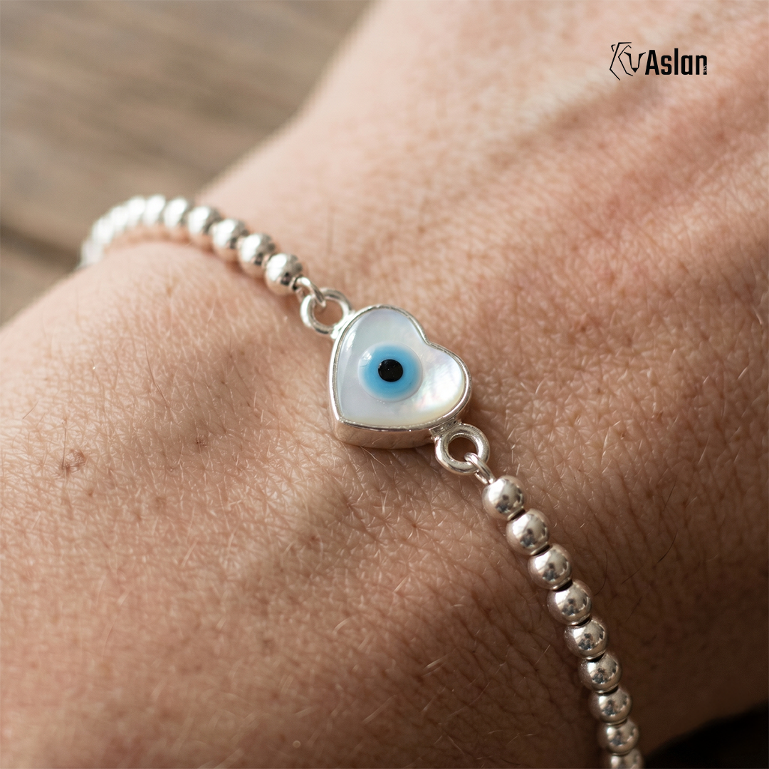 Pulsera de ojito montado
