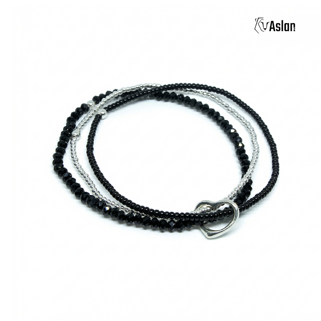 Pulsera triple con corazón