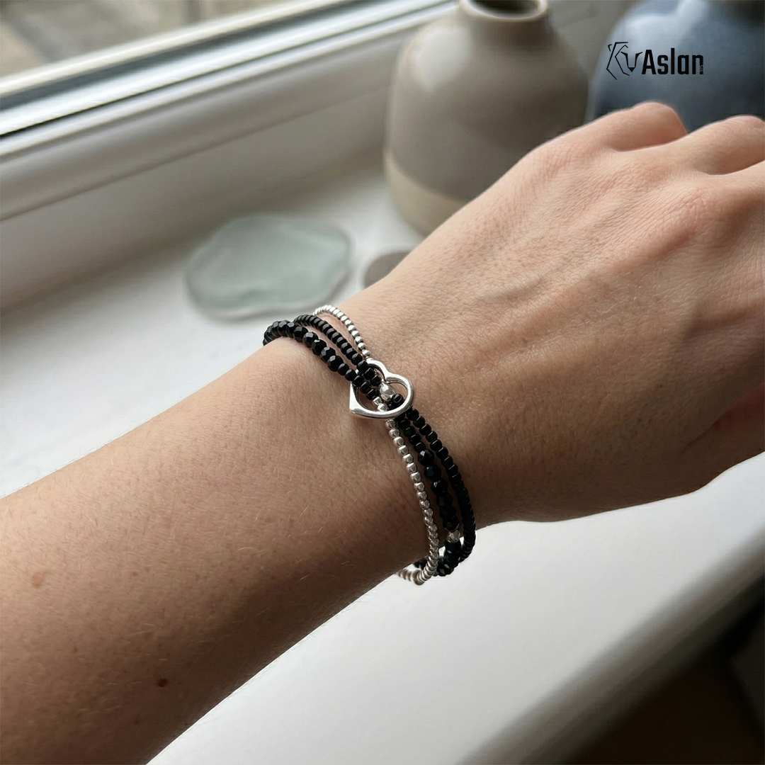 Pulsera triple con corazón