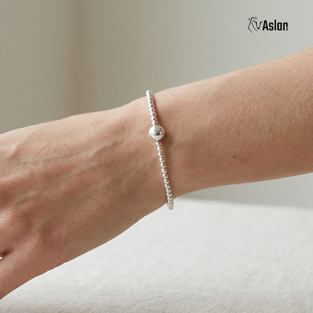 Pulsera bola de plata