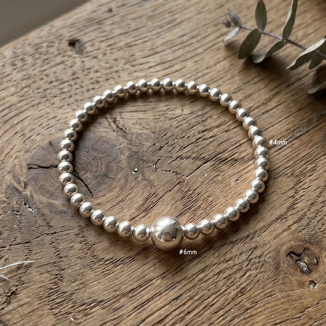 Pulsera brillo sutil