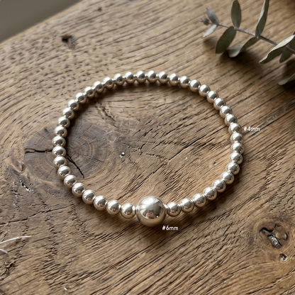 Pulsera brillo sutil