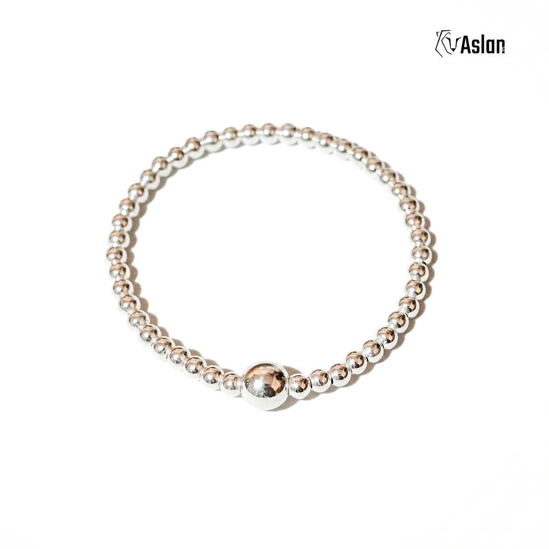 Pulsera brillo sutil