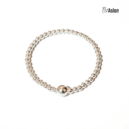 Pulsera brillo sutil
