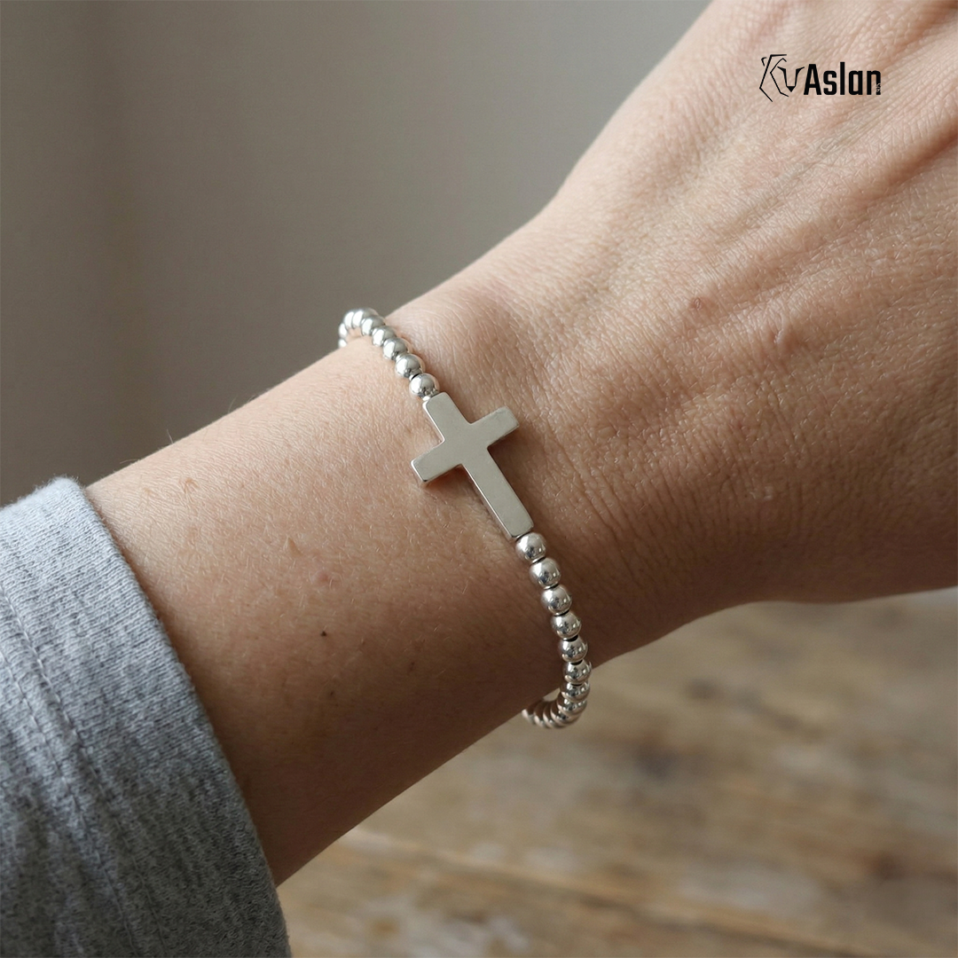 Pulsera cruz de plata tambor