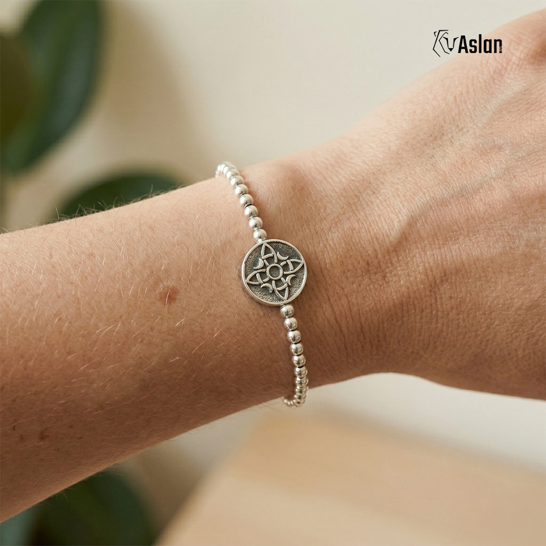 Pulsera medalla nudo de bruja