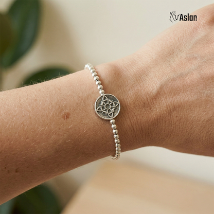 Pulsera medalla nudo de bruja