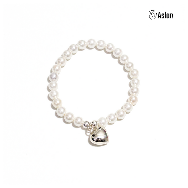 Pulsera corazón perla