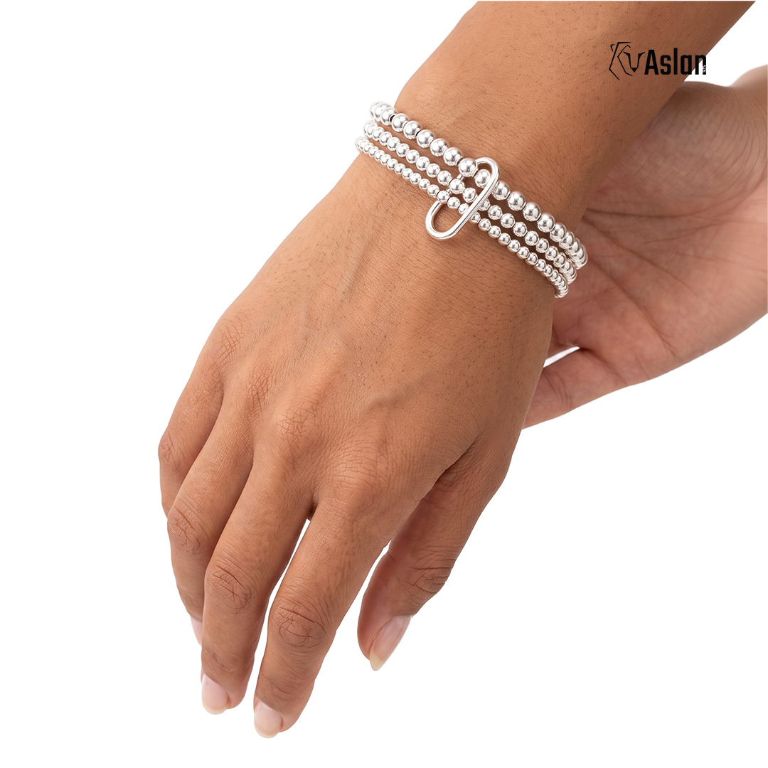 Pulsera triple con argolla
