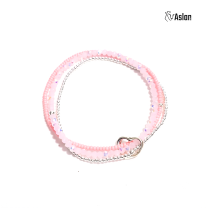 Pulsera triple de corazón pastel