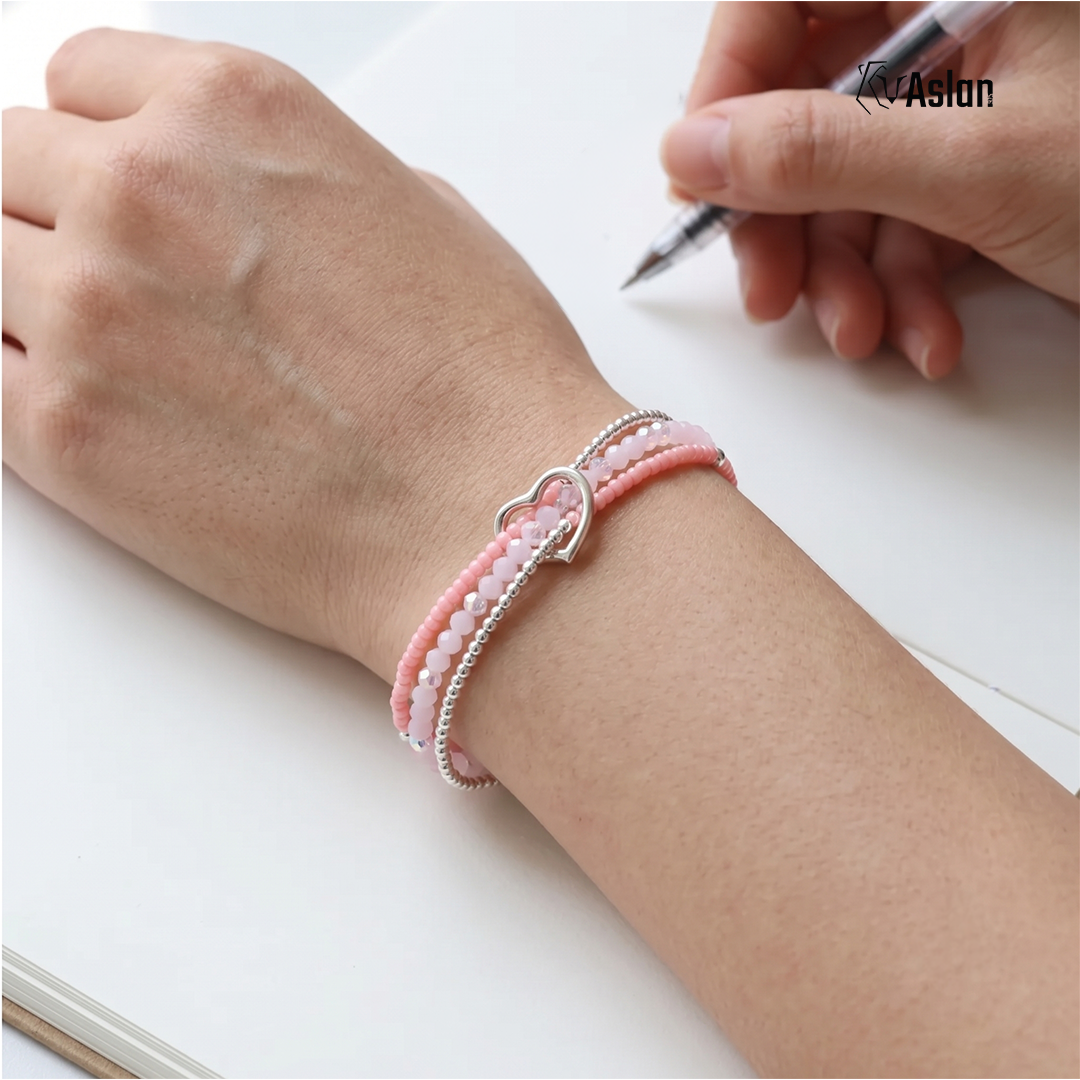 Pulsera triple de corazón pastel