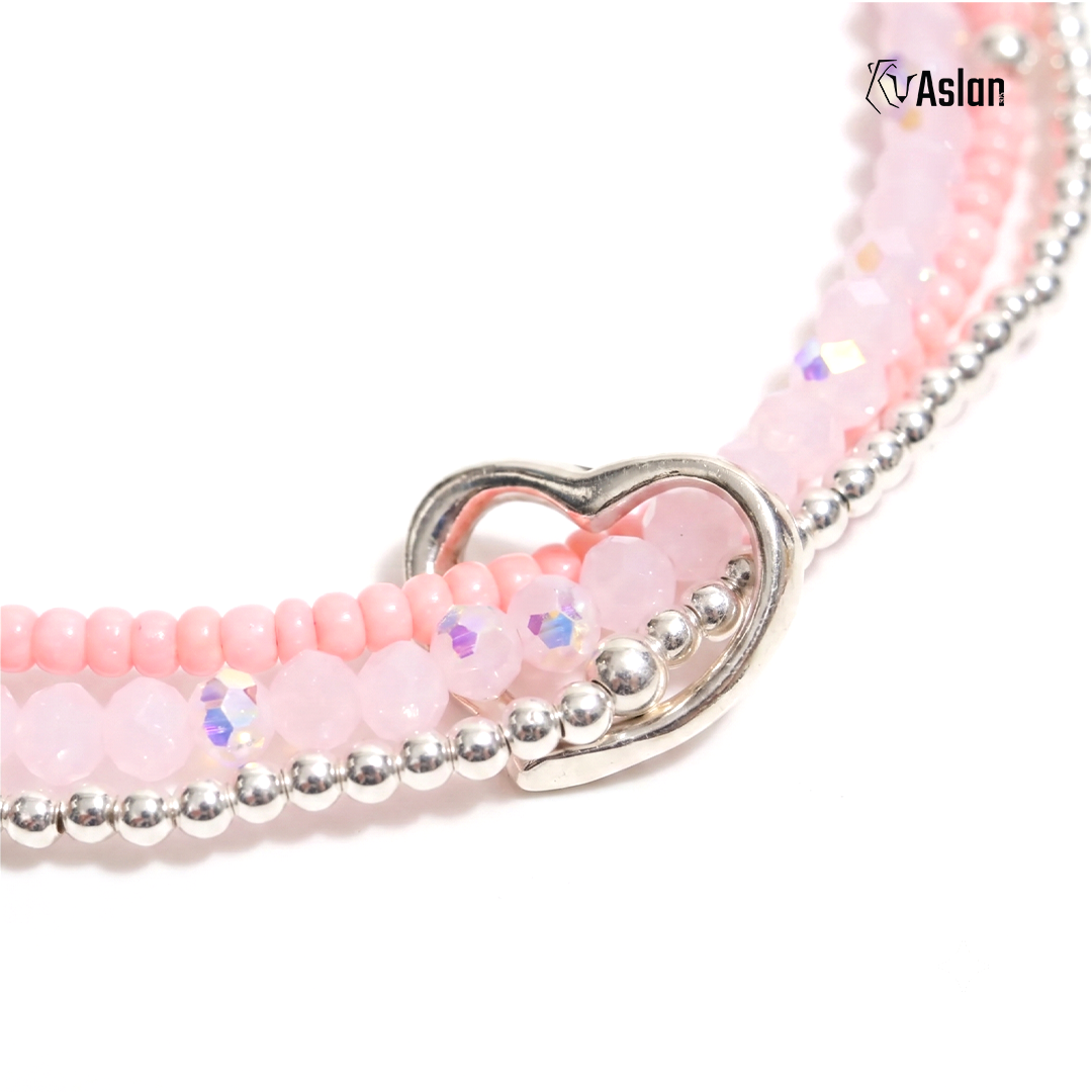 Pulsera triple de corazón pastel