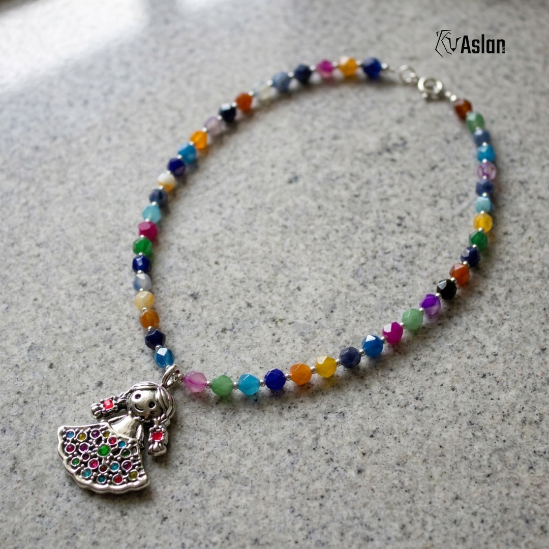 Collar Muñeca Otomí Multicolor sobre superficie