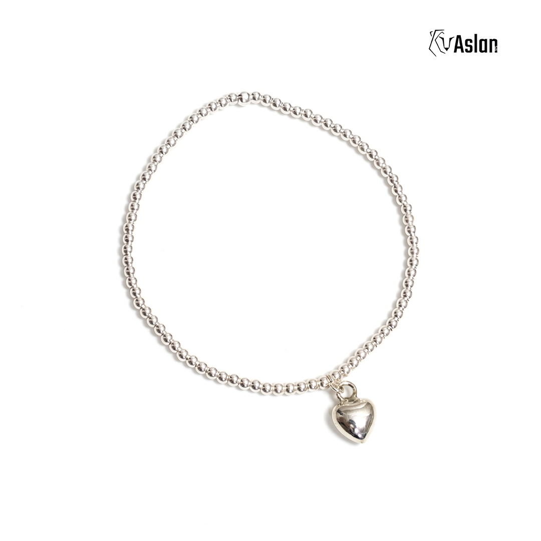 Pulsera corazón claro