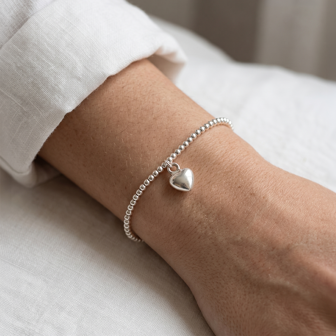Pulsera corazón claro