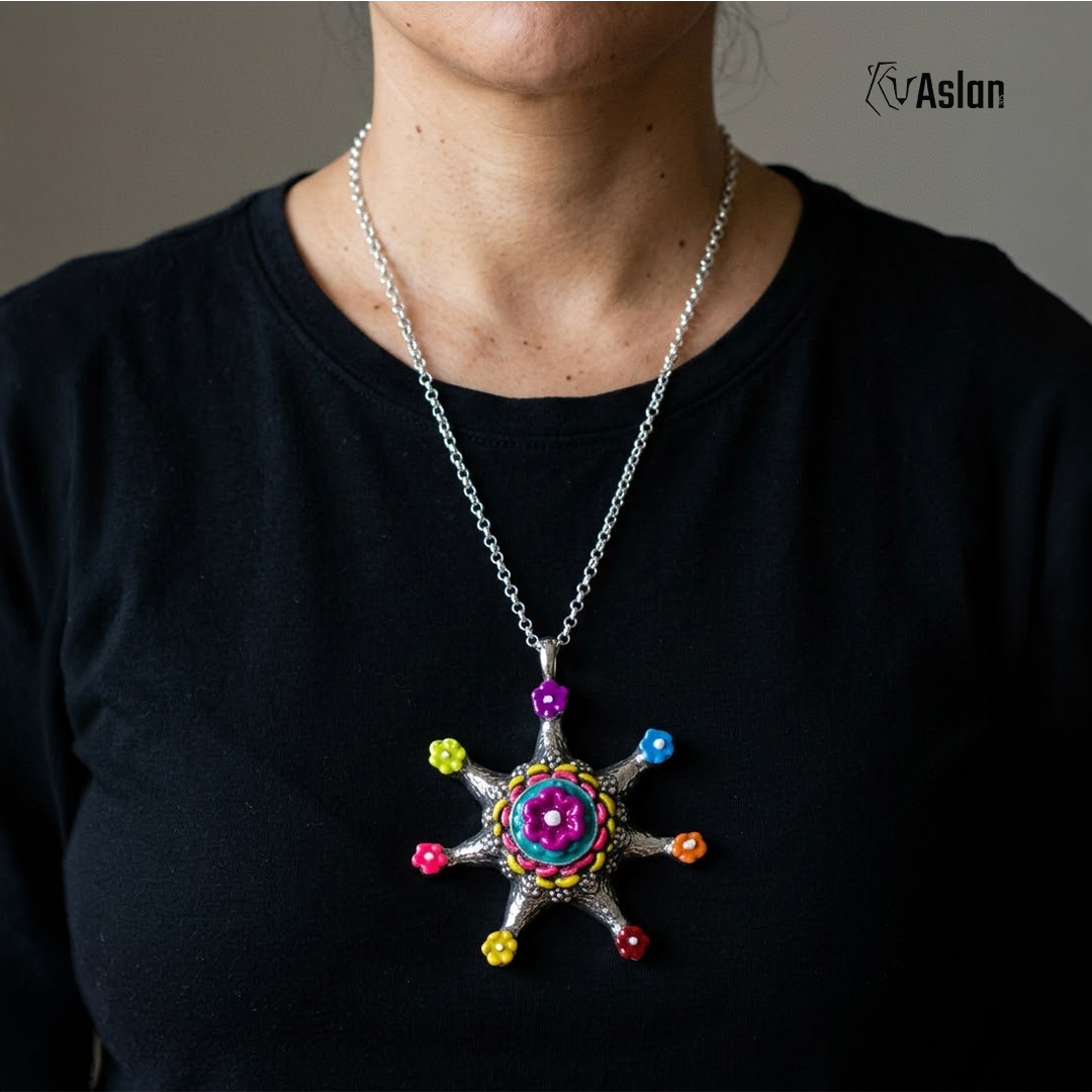 Dije Estrella de Flores
