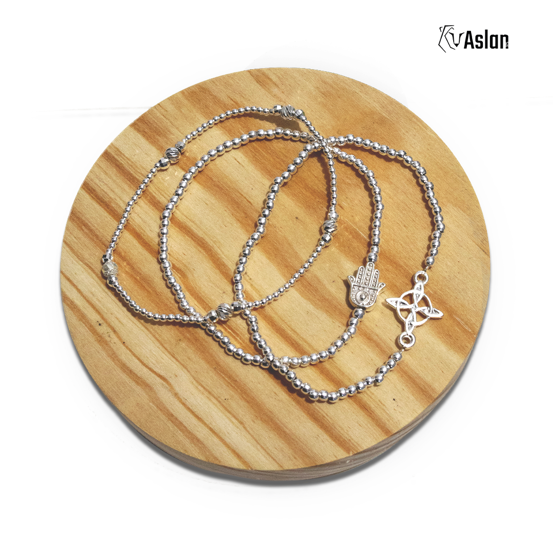 3 pulseras escudo de plata