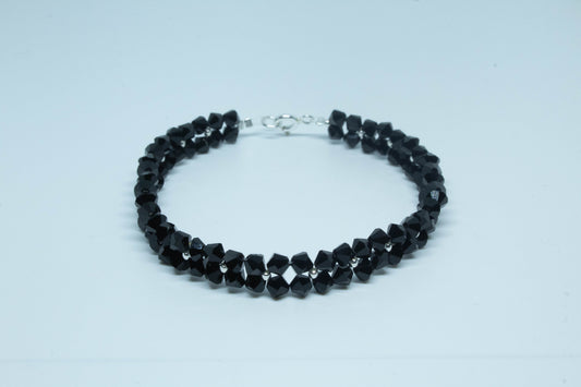 Pulsera tejida negra