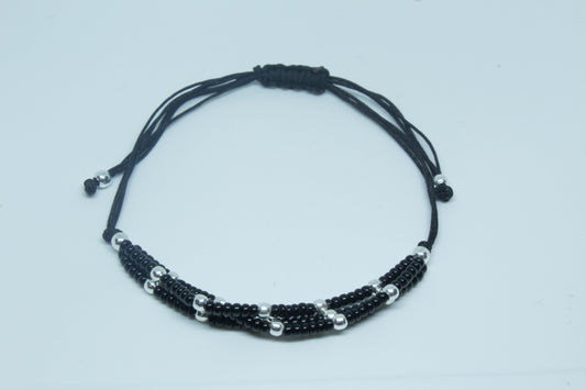 Pulsera 18 hilo y shakira negra